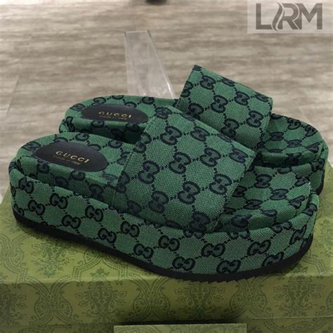 green gucci platform slides.